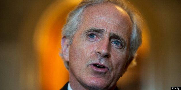 UNITED STATES - JUNE 20: Sen. Bob Corker, R-Tenn., speaks with reporters in the Capitol about the immigration reform bill in the Senate. (Photo By Tom Williams/CQ Roll Call)
