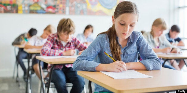 Students taking a test in classroom