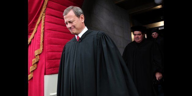 Supreme Court Chief Justice John Roberts arrives during the presidential inauguration on the West Front of the US Capitol January 21, 2013 in Washington, DC. Barack Obama was re-elected for a second term as President of the United States. AFP PHOTO/POOL/WIN MCNAMEE (Photo credit should read WIN MCNAMEE/AFP/Getty Images)