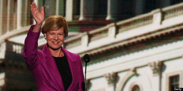 CHARLOTTE, NC - SEPTEMBER 06: U.S. Rep. Tammy Baldwin (D-WI) waves on stage during the final day of the Democratic National Convention at Time Warner Cable Arena on September 6, 2012 in Charlotte, North Carolina. The DNC, which concludes today, nominated U.S. President Barack Obama as the Democratic presidential candidate. (Photo by Alex Wong/Getty Images)