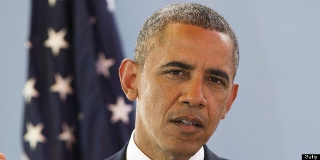 US President Barack Obama speaks on June 27, 2013 about the condition of former South African President Nelson Mandela during a press conference at the presidential palace in Dakar. AFP PHOTO / Saul LOEB (Photo credit should read SAUL LOEB/AFP/Getty Images)