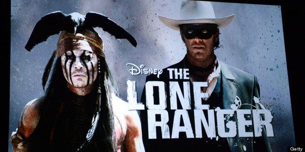 LAS VEGAS, NV - APRIL 17: An image on screen during at a Walt Disney Studios Motion Pictures presentation shows actor Johnny Depp (L) as the character Tonto and actor Armie Hammer as the Lone Ranger character from the upcoming film 'The Lone Ranger' at The Colosseum at Caesars Palace during CinemaCon, the official convention of the National Association of Theatre Owners, on April 17, 2013 in Las Vegas, Nevada. (Photo by Ethan Miller/Getty Images)