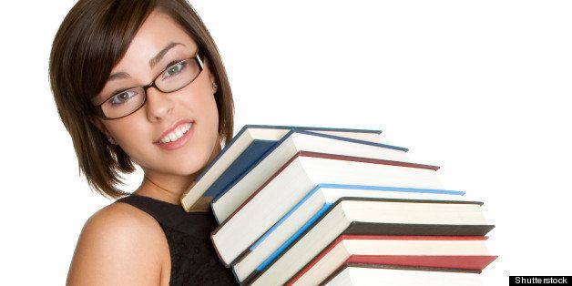 woman carrying books