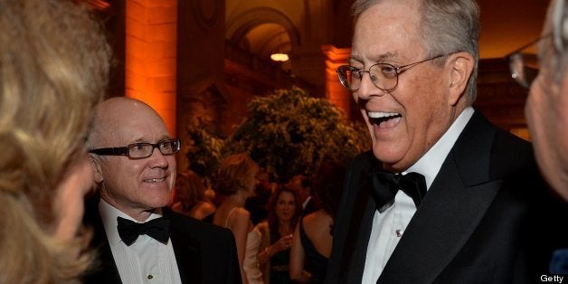 David Koch, executive vice president of chemical technology for Koch Industries Inc., right, speaks with Robert 'Woody' Johnson, owner and chief executive officer of New York Jets LLC, during the Memorial Sloan-Kettering Cancer Center 5th Annual Spring Ball at the Metropolitan Museum in New York, U.S., on Wednesday, April 25, 2012. The Spring Ball celebrates the hard work and dedication of the Cancer Center. Photographer: Amanda Gordon/Bloomberg via Getty Images 