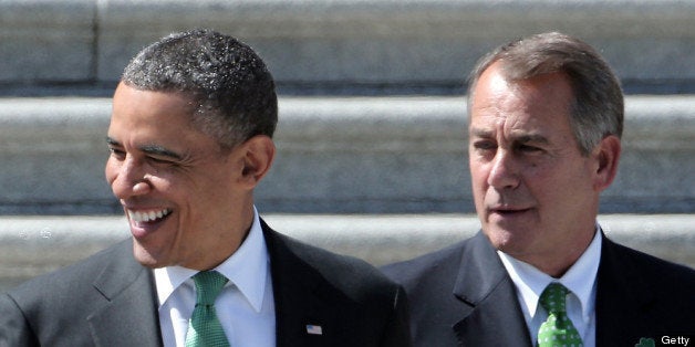 WASHINGTON, DC - MARCH 19: U.S. President Barack Obama (L) is escorted by U.S. Speaker of the House John Boehner (R-OH) while leaving the U.S. Capitol on March 19, 2013 in Washington, DC. Obama and Kenny attended the annual Friends of Ireland luncheon, which usually coincides with St. Patricks's Day, hosted by the House of Representatives at the U.S. Capitol. (Photo by Win McNamee/Getty Images)