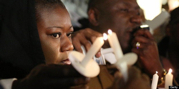 NEW YORK, NY - FEBRUARY 26: Sybrina Fulton (L), mother of Trayvon Martin, attends a candlelight vigil for Martin in Union Square on February 26, 2013 in New York, New York. Vigils were held in Florida and New York on the one year anniversary of teenager Trayvon Martin's shooting death by George Zimmerman in Florida. (Photo by Mario Tama/Getty Images)