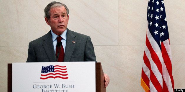 DALLAS, TX - JULY 10: Former U.S. President George W. Bush speaks during a immigration naturalization ceremony held at the George W. Bush Presidential Center on July 10, 2013 in Dallas, Texas. Bush delivered keynote remarks during the naturalization ceremony, where 20 candidates took the oath of allegiance and became American citizens. (Photo by Tom Pennington/Getty Images)