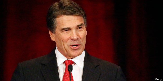 GRAPEVINE, TX - JUNE 27: Texas Gov. Rick Perry speaks to the National Right to Life convention at the Hyatt Regency DFW International Airport Hotel June 27, 2013 in Grapevine, Texas. Perry has reportedly vowed to continue the fight for a more restrictive abortion law in Texas after the state legislature failed to get the law passed during a special session because of a filibuster and protests. (Photo by Stewart F. House/Getty Images)