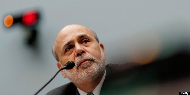 Ben S. Bernanke, chairman of the U.S. Federal Reserve, listens during his semi-annual monetary policy report to the House Financial Services Committee in Washington, D.C., U.S., on Wednesday, July 17, 2013. Bernanke said the central banks asset purchases 'are by no means on a preset course' and could be reduced more quickly or expanded as economic conditions warrant. Photographer: Pete Marovich/Bloomberg via Getty Images 