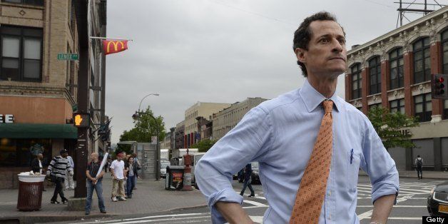 Former US Representative Anthony Weiner greets voters and residents in the Harlem neighborhood of New York City on May 23, 2013. Weiner, who resigned from Congress two years ago in disgrace over his racy Twitter messages, announced he is running for New York City Mayor. AFP PHOTO / TIMOTHY CLARY (Photo credit should read TIMOTHY CLARY/AFP/Getty Images)