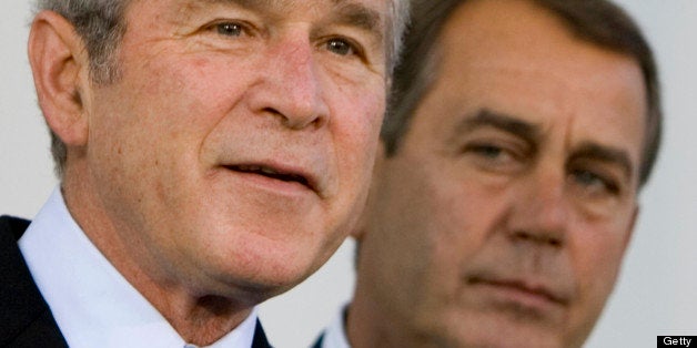 UNITED STATES - OCTOBER 30: Representative John Boehner, right, minority leader of the House, listens to President George W. Bush make a statement at the White House in Washington, D.C., U.S., on Tuesday, Oct. 30, 2007. Bush said he would reject any attempt by Congress to combine legislation funding military operations and veterans healthcare with a domestic spending measure that he opposes. (Photo by Joshua Roberts/Bloomberg via Getty Images)