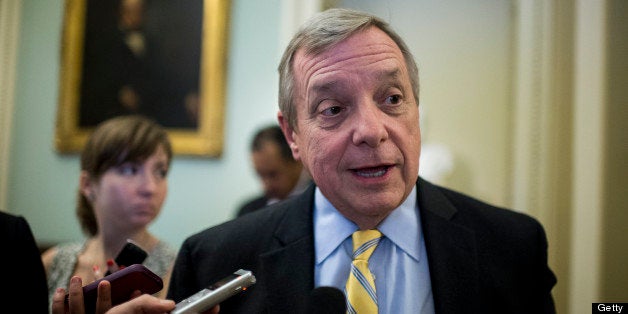 UNITED STATES - JULY 11: Sen. Richard Durbin, D-Ill., speaks with reporters as he arrives for the Senate Democrats' caucus lunch on Thursday, July 11, 2013. (Photo By Bill Clark/CQ Roll Call)