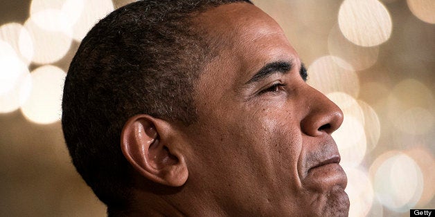 US President Barack Obama pauses while making a statement in the East Room of the White House on July 18, 2013 in Washington, DC. Obama spoke about the Affordable Care Act. AFP PHOTO/Brendan SMIALOWSKI (Photo credit should read BRENDAN SMIALOWSKI/AFP/Getty Images)