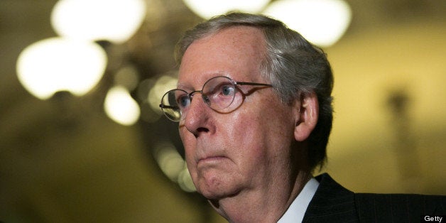 WASHINGTON, DC - JULY 9: Senate Minority Leader Mitch McConnell (R-KY) gives a press conference after meeting with fellow Republican Senators on Capitol Hill July 9, 2013 in Washington, DC. The senators fielded questions about student loan legislation. (Photo by Drew Angerer/Getty Images)