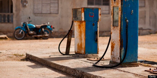 Old petrol pump on lot