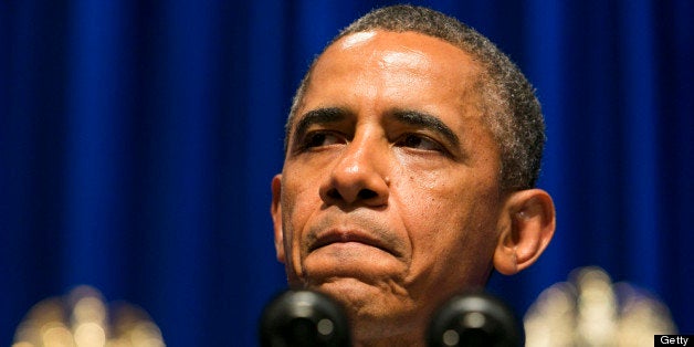 WASHINGTON, DC - JULY 22: (AFP OUT) U.S. President Barack Obama delivers remarks at an Organizing for Action event at the Mandarin Oriental hotel July 22, 2013 in Washington, DC. (Photo by Kristoffer Tripplaar-Pool/Getty Images)