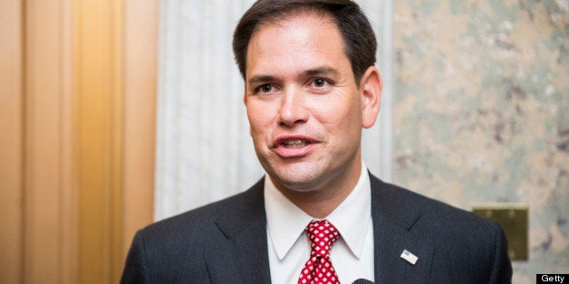 UNITED STATES - MAY 7: Sen. Marco Rubio, R-Fla., speaks with reporters outside of the Senate floor in the Capitol on Tuesday,