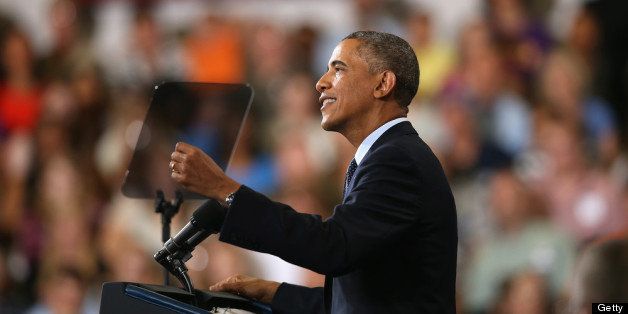 GALESBURG, IL - JULY 24: President Barack Obama addresses the state of the economy during a speech at Knox College on July 24, 2013 in Galesburg, Illinois. Obama is scheduled to speak later today in Warrensburg, Missouri. (Photo by Scott Olson/Getty Images)
