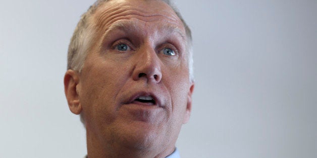 N.C. House Speaker Thom Tillis speaks to supporters at a rally at the Buncombe County Republican headquarters in Asheville, N.C., Friday, Aug. 29, 2014. Tillis is the Republican nominee for the U.S. Senate and is running against Democratic Sen. Kay Hagan in the fall.(AP Photo/Chuck Burton)