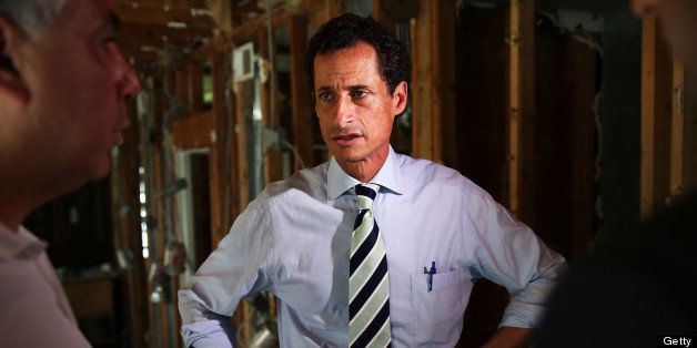 NEW YORK, NY - JULY 26: Anthony Weiner, a leading candidate for New York City mayor, stands in a storm damaged home while meeting with residents in Staten Island whose homes were damaged by Hurricane Sandy on July 26, 2013 in New York City. It was recently revealed that Weiner engaged in lewd online conversations with a woman after he resigned from Congress for similar previous incidents. (Photo by Spencer Platt/Getty Images)