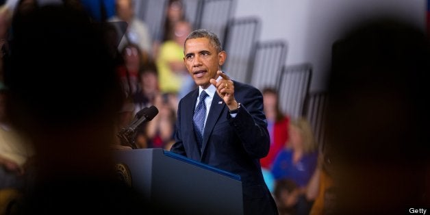 President Barack Obama delivers an address on economics at Knox College in Galesburg, Illinois, on Wednesday, July 24, 2013. Obama called for new spending on infrastructure and education to help grow the middle class. (Zbigniew Bzdak/Chicago Tribune/MCT via Getty Images)