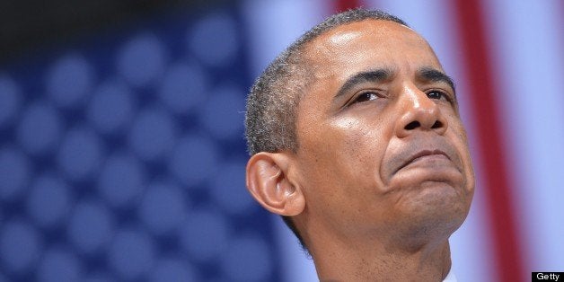 US President Barack Obama speaks on job growth following a tour of an Amazon fulfillment center on July 30, 2013 in Chattanooga, Tennessee. AFP PHOTO/Mandel NGAN (Photo credit should read MANDEL NGAN/AFP/Getty Images)