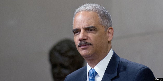 US Attorney General Eric Holder speaks at the Justice Department's Lesbian, Gay, Bisexual and Transgender (LGBT) Pride Month event at the Justice Department in Washington,DC on June 18, 2013. AFP PHOTO/Nicholas KAMM (Photo credit should read NICHOLAS KAMM/AFP/Getty Images)