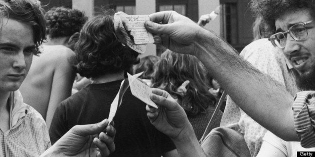 Antiwar demonstrators burn their draft cards on the steps of the Pentagon during the Vietnam War, Washington, DC. (Photo by Hulton Archive/Getty Images)