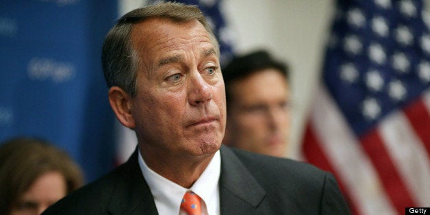 WASHINGTON, DC - JULY 31: Speaker of the House John Boehner (R-OH) answers reporters' questions during a brief news conference after the weekly House Republican Caucus meeting at the U.S. Capitol July 31, 2013 in Washington, DC. Boehner and other Republican legislators have responded negatively to a 'grand bargain' proposal to lower corporate tax rates in exchange for a boost in infrastructure spending and help for the middle class put forward by President Barack Obama, who met with Democratic lawmakers at the capitol today. (Photo by Chip Somodevilla/Getty Images)