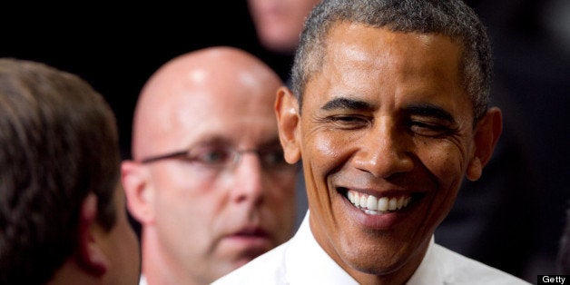 CHATTANOOGA, TN - JULY 30: U.S. President Barack Obama greets people after making a speech about the economy and jobs at an Amazon.com Fulfillment Center July 30, 2013 in Chattanooga, Tennessee. Obama proposed a corporate tax reform that will use billions of dollars in revenues generated by a business tax to create jobs. Amazon announced this week that it expects to have 7,000 job openings across the country. (Photo by Jessica McGowan/Getty Images)