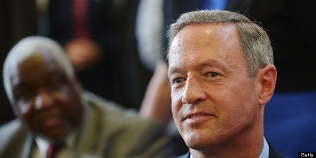 Maryland Governor Martin O'Malley is seated before remarks by US President Barack Obama following a tour of Ellicott Dredges on May 17, 2013 in Baltimore, Maryland. Obama is visiting Baltimore on what the administration called ' his second Middle Class Jobs and Opportunity Tour'. AFP PHOTO/Mandel NGAN (Photo credit should read MANDEL NGAN/AFP/Getty Images)