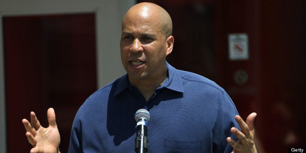 NEWARK, NJ - JUNE 29: Newark mayor Cory Booker speaks at the New Jersey Legacy Tree Project Press Conference at Prudential Center on June 29, 2013 in Newark, New Jersey. As part of the NHL's commitment to support the local environment of host cities for NHL events through its NHL Green initiative, the NHL Foundation has donated 30 trees to the Devils Care Foundation. (Photo by Dave Sandford/NHLI via Getty Images)