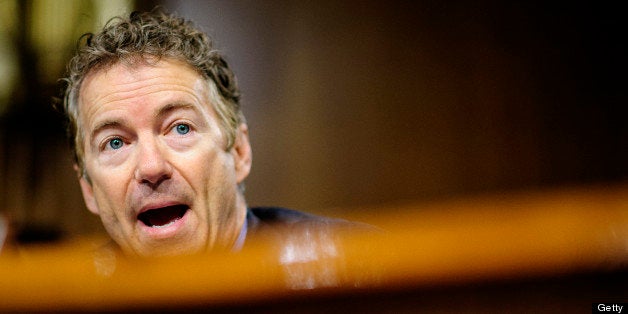 Senator Rand Paul, a Republican from Kentucky, quesions a witness during a Senate Permanent Subcommittee on Investigations hearing in Washington, D.C., U.S., on Tuesday, May 21, 2013. Apple Inc. Chief Executive Officer Tim Cook defended his company?s use of offshore tax shelters before U.S. senators who castigated the most-valuable technology company for avoiding $9 billion and more in payments. Photographer: Pete Marovich/Bloomberg via Getty Images