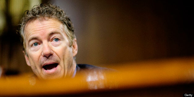 Senator Rand Paul, a Republican from Kentucky, quesions a witness during a Senate Permanent Subcommittee on Investigations hearing in Washington, D.C., U.S., on Tuesday, May 21, 2013. Apple Inc. Chief Executive Officer Tim Cook defended his company?s use of offshore tax shelters before U.S. senators who castigated the most-valuable technology company for avoiding $9 billion and more in payments. Photographer: Pete Marovich/Bloomberg via Getty Images 