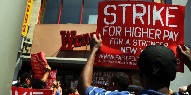 NEW YORK, NY - JULY 29: Employees and supporters demonstrate outside of a Wendy's fast-food restaurant to demand higher pay a