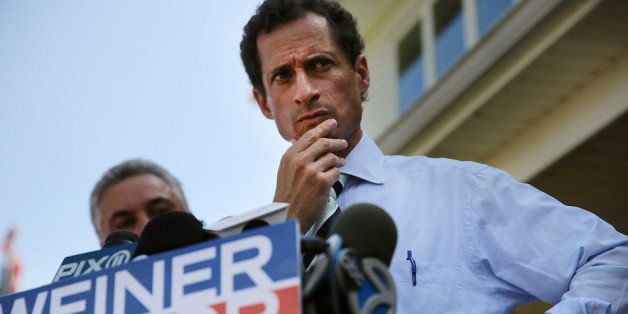 NEW YORK, NY - JULY 26: Anthony Weiner, a leading candidate for New York City mayor, pauses while speaking with reporters in Staten Island on a visit to homes damaged by Hurricane Sandy on July 26, 2013 in New York City. It was recently revealed that Weiner engaged in lewd online conversations with a woman after he resigned from Congress for similar previous incidents. (Photo by Spencer Platt/Getty Images)