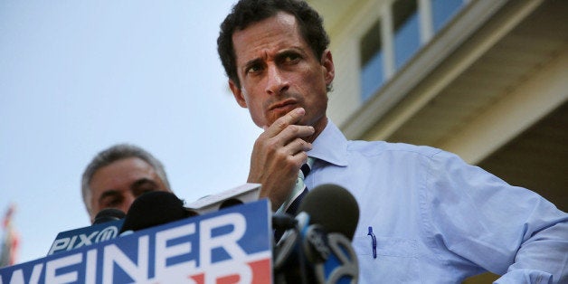 NEW YORK, NY - JULY 26: Anthony Weiner, a leading candidate for New York City mayor, pauses while speaking with reporters in