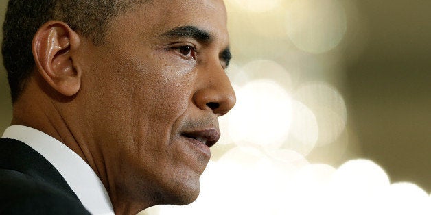 WASHINGTON, DC - AUGUST 09: U.S. President Barack Obama answers questions during a press conference in the East Room of the White House August 9, 2013 in Washington, DC. Obama answered questions on national security issues and related matters during the press conferece. (Photo by Win McNamee/Getty Images)