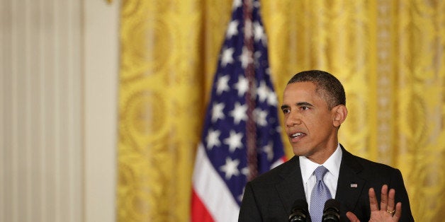 WASHINGTON, DC - AUGUST 09: U.S. President Barack Obama delivers opening remarks during a news conference in the East Room o
