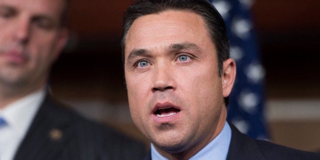 UNITED STATES - DECEMBER 13: Rep. Michael Grimm, R-N.Y., speaks during the news conference to announce bipartisan tax relief