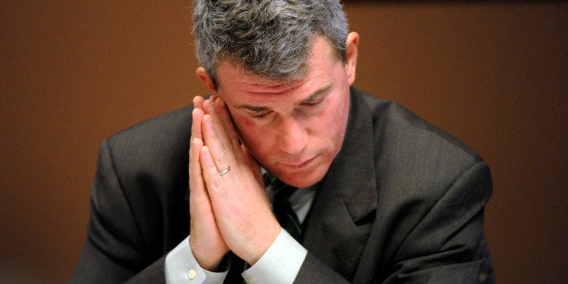 Colorado Secretary of State, Scott Gessler during a campaign and political finance hearing at the Secretary of State offices