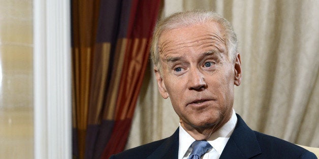 U.S. Vice President Joseph 'Joe' Biden gestures as he speaks during an interview in Singapore, on Saturday, July 27, 2013. Biden said the U.S. is pushing China to negotiate quickly with Southeast Asian nations on a code of conduct for the South China Sea, an area that's a 'major, major, major highway of commerce.' Photographer: Munshi Ahmed/Bloomberg via Getty Images 