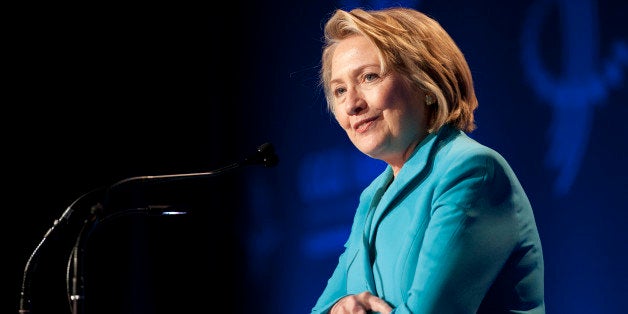 Hillary Clinton, former U.S. secretary of state, smiles while speaking during the Clinton Global Initiative CGI America meeting in Chicago, Illinois, U.S., on Thursday, June 13, 2013. New Jersey governor Chris Christie and Democrat Clinton, both potential presidential candidates will be able to use the forum to test policy messages in front of an audience of U.S. mayors and other civic and business leaders. Photographer: Daniel Acker/Bloomberg via Getty Images 