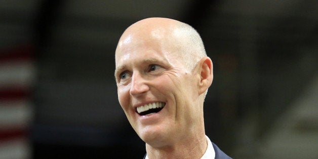 Florida Gov. Rick Scott delivers remarks at .decimal, Inc. (pronounced 'dot-decimal') during a visit to the medical device manufacturer's facility in Sanford, Monday, April 29, 2013. (Joe Burbank/Orlando Sentinel/MCT via Getty Images)