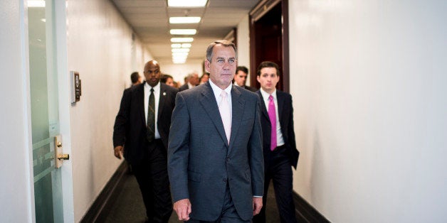 UNITED STATES - JULY 23: Speaker of the House John Boehner, R-Ohio, leaves the House Republican Conference meeting in the bas