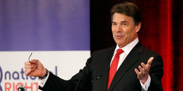 GRAPEVINE, TX - JUNE 27: Texas Gov. Rick Perry speaks to the National Right to Life convention at the Hyatt Regency DFW International Airport Hotel June 27, 2013 in Grapevine, Texas. Perry has reportedly vowed to continue the fight for a more restrictive abortion law in Texas after the state legislature failed to get the law passed during a special session because of a filibuster and protests. (Photo by Stewart F. House/Getty Images)