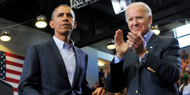 US President Barack Obama (L) and Vice President Joe Biden greet attendees after Obama spoke on college affordability at the Lackawanna College in Scranton, Pennsylvania, on August 23, 2013. Obama is on a two-day bus tour through New York and Pennsylvania to discuss his plan to make college more affordable, tackle rising costs, and improve value for students and their families. AFP Photo/Jewel Samad (Photo credit should read JEWEL SAMAD/AFP/Getty Images)