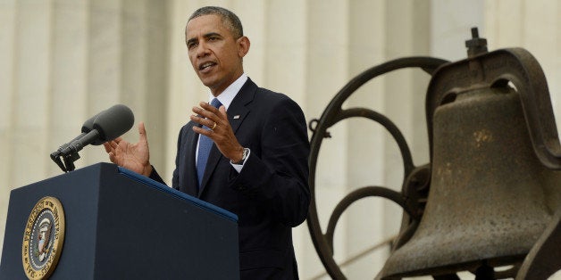 U.S. President Barack Obama speaks during the Let Freedom Ring commemoration event at the Lincoln Memorial in Washington, D.C., U.S., on Wednesday, Aug. 28, 2013. Obama, speaking from the same Washington stage where Martin Luther King Jr. delivered a defining speech of the civil rights movement, said that even as the nation has been transformed, work remains in countering growing economic disparities. Photographer: Michael Reynolds/Pool via Bloomberg 