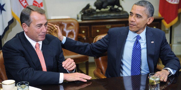 WASHINGTON - NOVEMBER 16: U.S. President Barack Obama (R) sits with Speaker of the House John Boehner (R-OH) during a meeting with bipartisan group of congressional leaders in the Roosevelt Room of the White House on November 16, 2012 in Washington, DC. Obama and congressional leaders of both parties are meeting to reportedly discuss deficit reduction before the tax increases and automatic spending cuts go into affect in the new year. (Photo by Olivier Douliery-Pool/Getty Images)