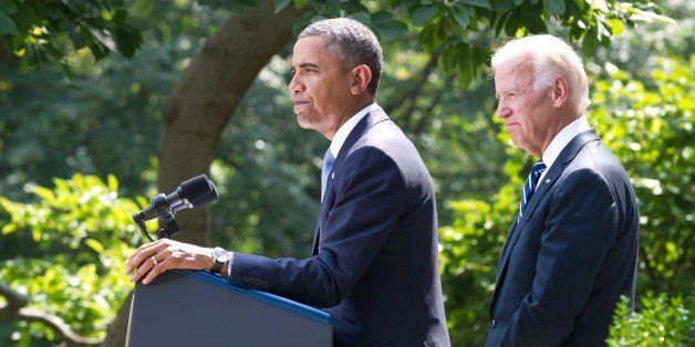 US President Barack Obama speaks on Syria in the Rose Garden at the White House in Washington on August 31, 2013 as Vice President Joe Biden looks on. Obama said Saturday he will ask the US Congress to authorize military action against Syria, lifting the threat of immediate strikes on President Bashar al-Assad's regime. Obama said he had decided he would go ahead and launch military action on Syria, but he believed it was important for American democracy to win the support of lawmakers. AFP PHOTO/Nicholas KAMM (Photo credit should read NICHOLAS KAMM/AFP/Getty Images)